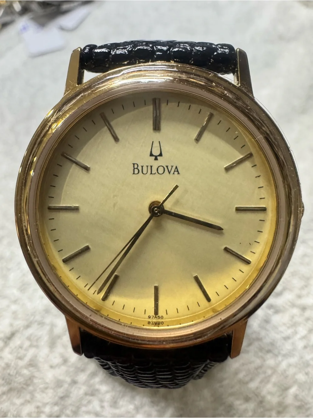 Bulova Gold Dial Men's Watch with Black Leather Strap